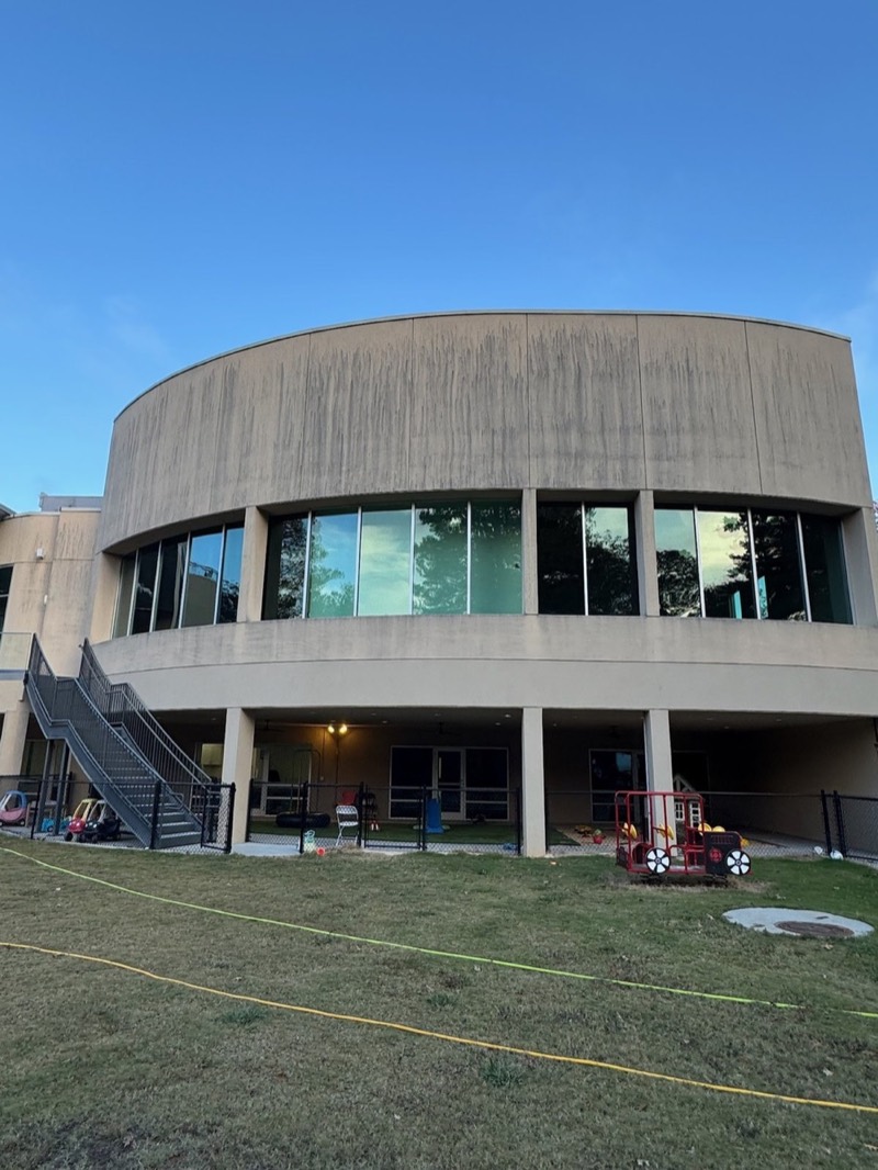 Commercial building before pressure washing